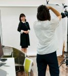 撮影中のフォトグラファーと参加者
